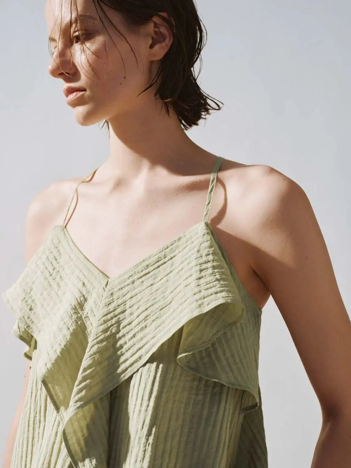 10151-strappy-ruffle-trim-cami-tops-3.webp Strappy Ruffle Trim Cami Tops