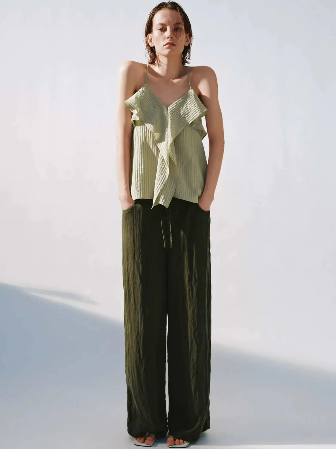 10151-strappy-ruffle-trim-cami-tops-4.webp Strappy Ruffle Trim Cami Tops
