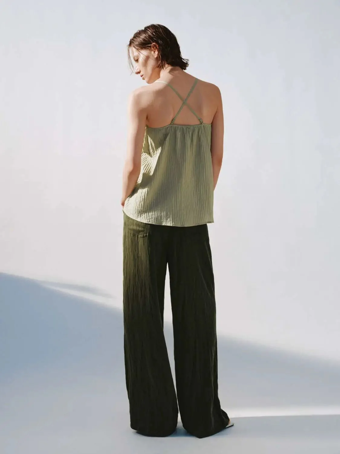 10151-strappy-ruffle-trim-cami-tops-6.webp Strappy Ruffle Trim Cami Tops