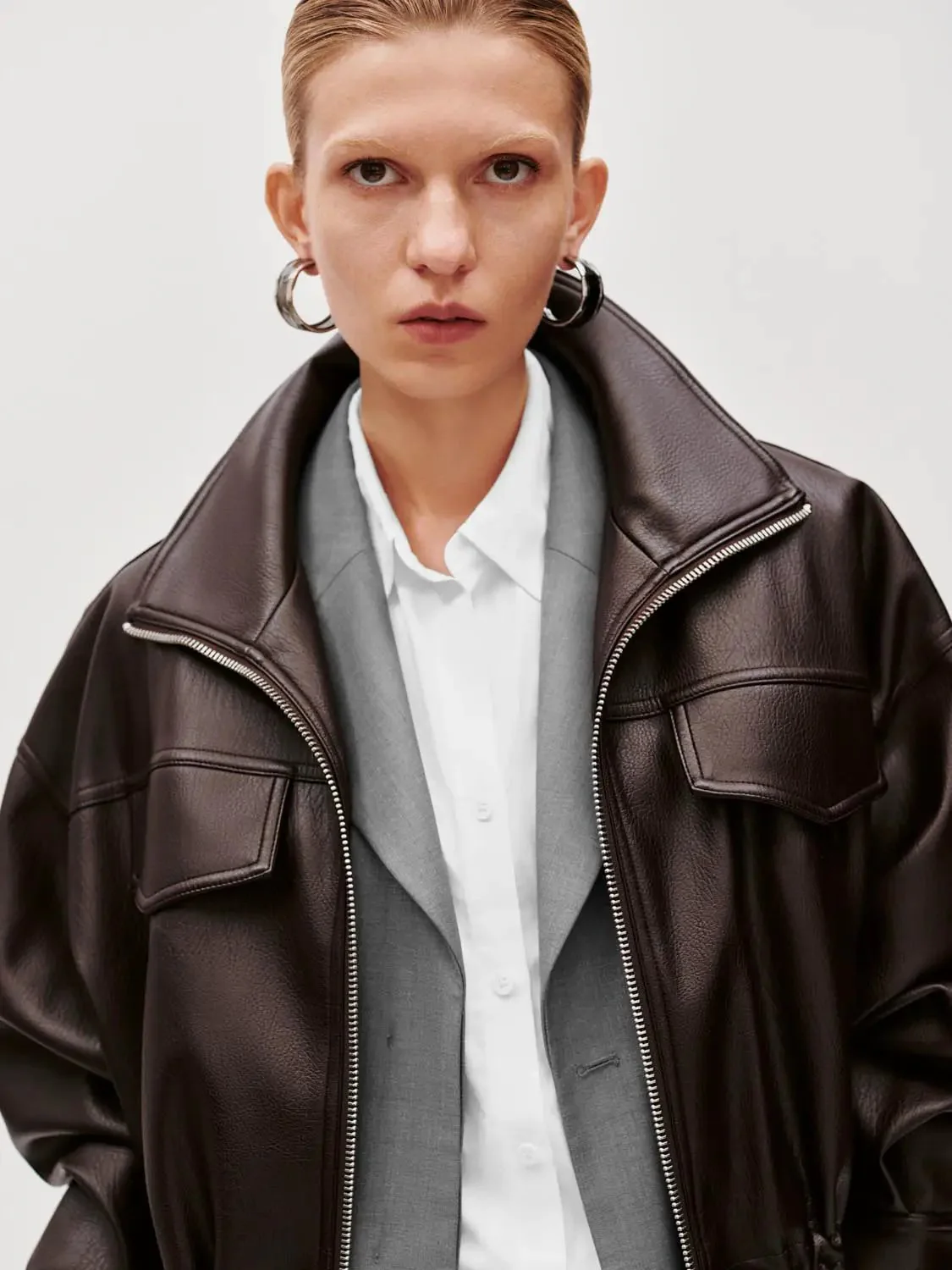 10206-leather-look-drawstring-pockets-bomber-jacket-3.webp Leather Look Drawstring Pockets Bomber Jacket