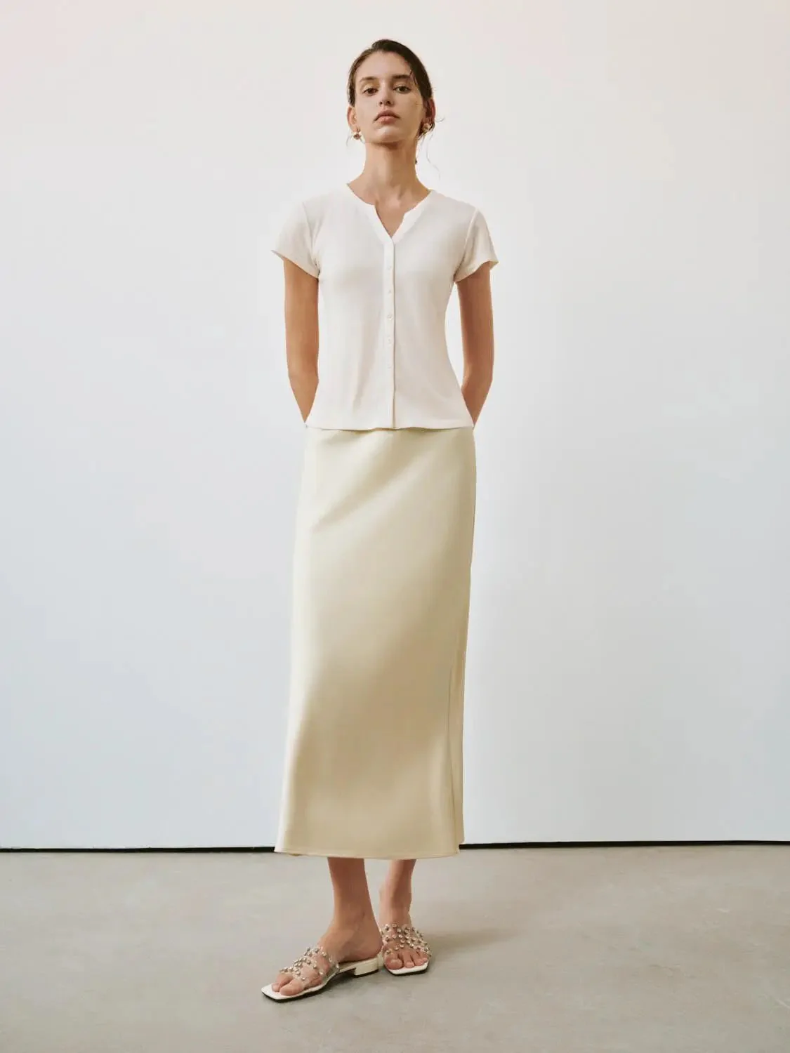 1069-elegant-cream-fishtail-midi-stretch-skirt-7.webp Elegant Cream Fishtail Midi Stretch Skirt
