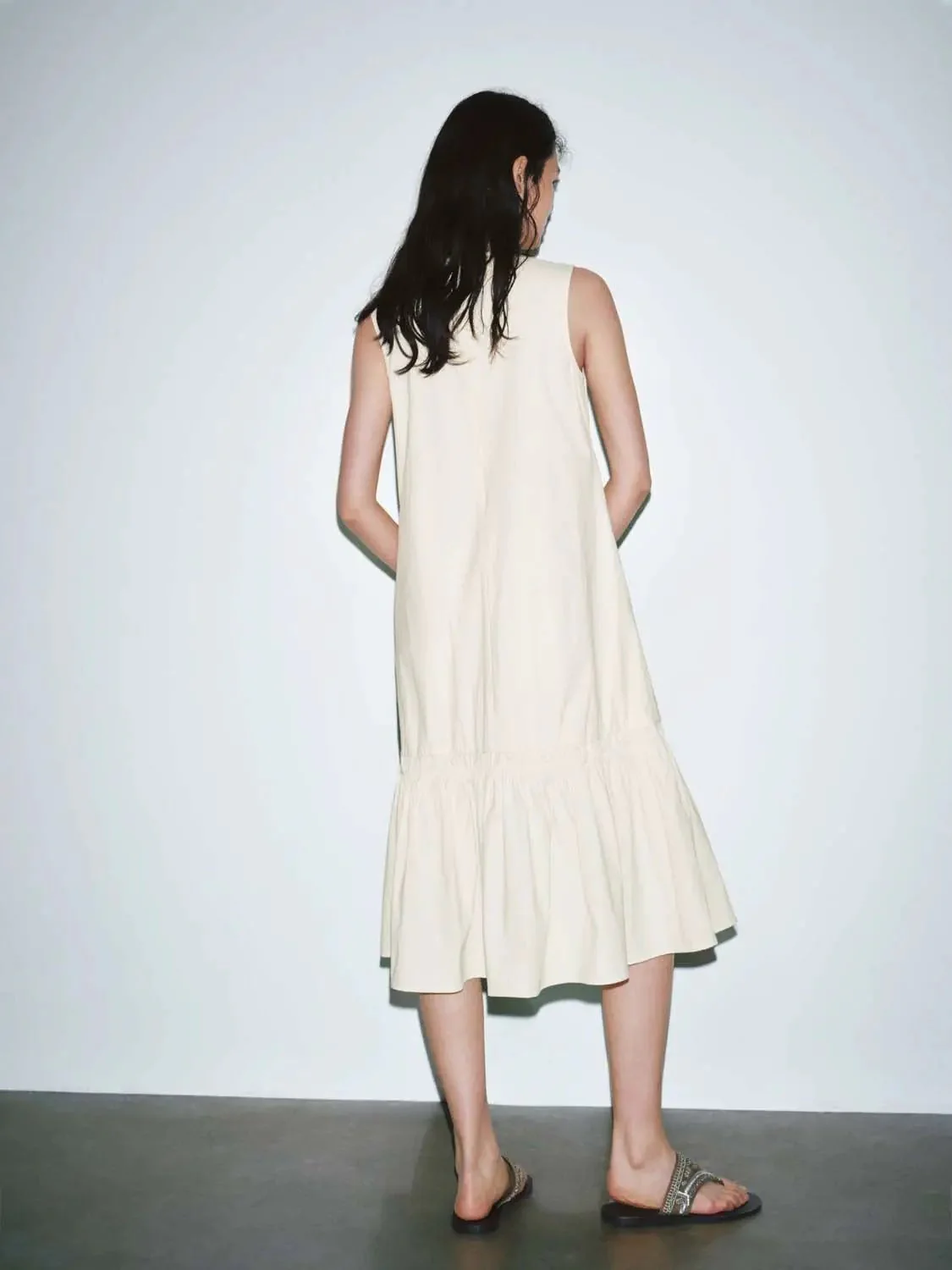 11695-elegant-sleeveless-crew-neck-a-line-ruffle-hem-midi-dress-12.webp Elegant Sleeveless Crew Neck A Line Ruffle Hem Midi Dress