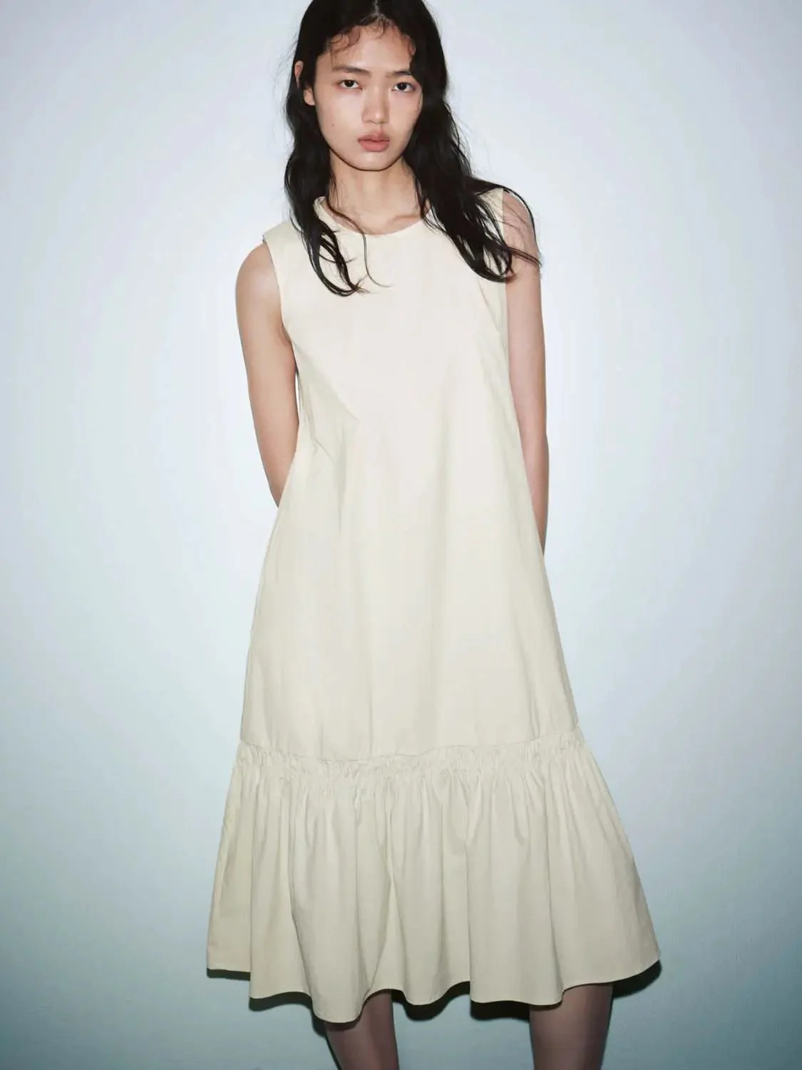 11695-elegant-sleeveless-crew-neck-a-line-ruffle-hem-midi-dress-14.webp Elegant Sleeveless Crew Neck A Line Ruffle Hem Midi Dress