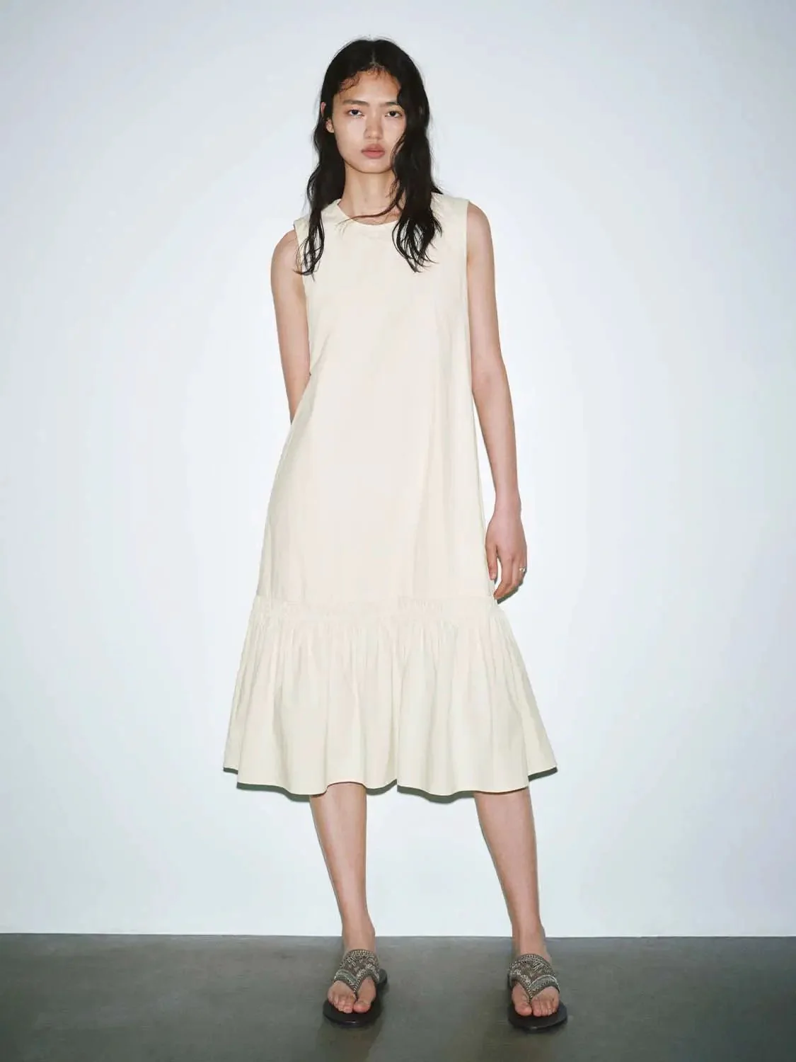 11695-elegant-sleeveless-crew-neck-a-line-ruffle-hem-midi-dress-18.webp Elegant Sleeveless Crew Neck A Line Ruffle Hem Midi Dress