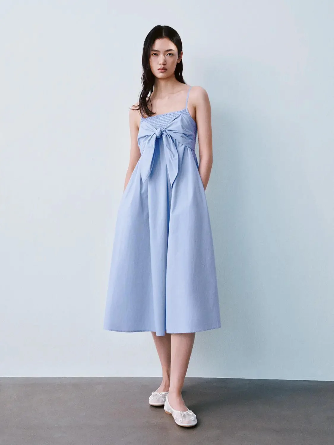 12107-cotton-strappy-bow-tie-front-a-line-midi-dress-1.webp Cotton Strappy Bow Tie Front A-Line Midi Dress
