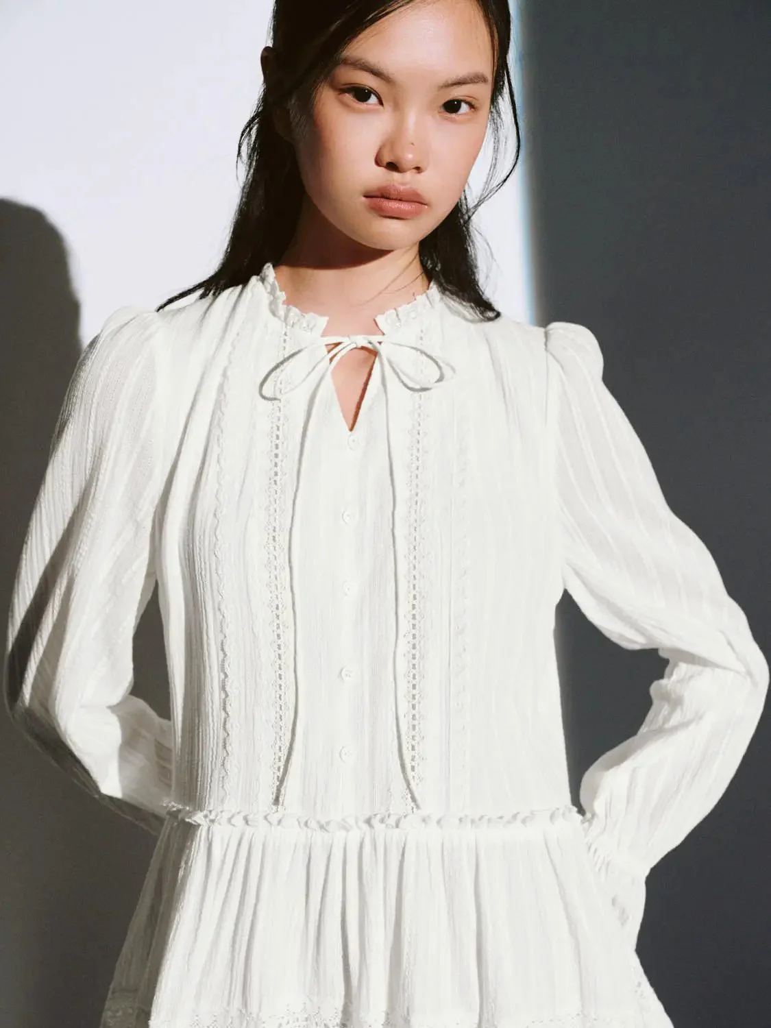 12507-white-cotton-tiered-long-sleeve-lace-trim-dress-3.webp White Cotton Tiered Long Sleeve Lace Trim Dress