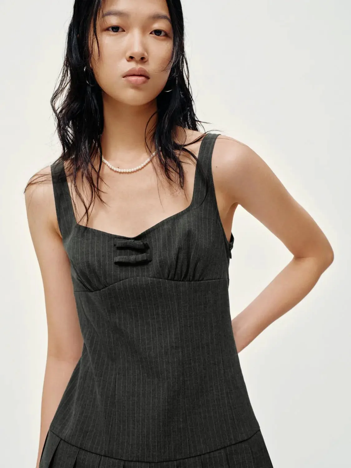 12708-chic-strappy-striped-pleated-mini-dresses-3.webp Chic Strappy Striped Pleated Mini Dresses