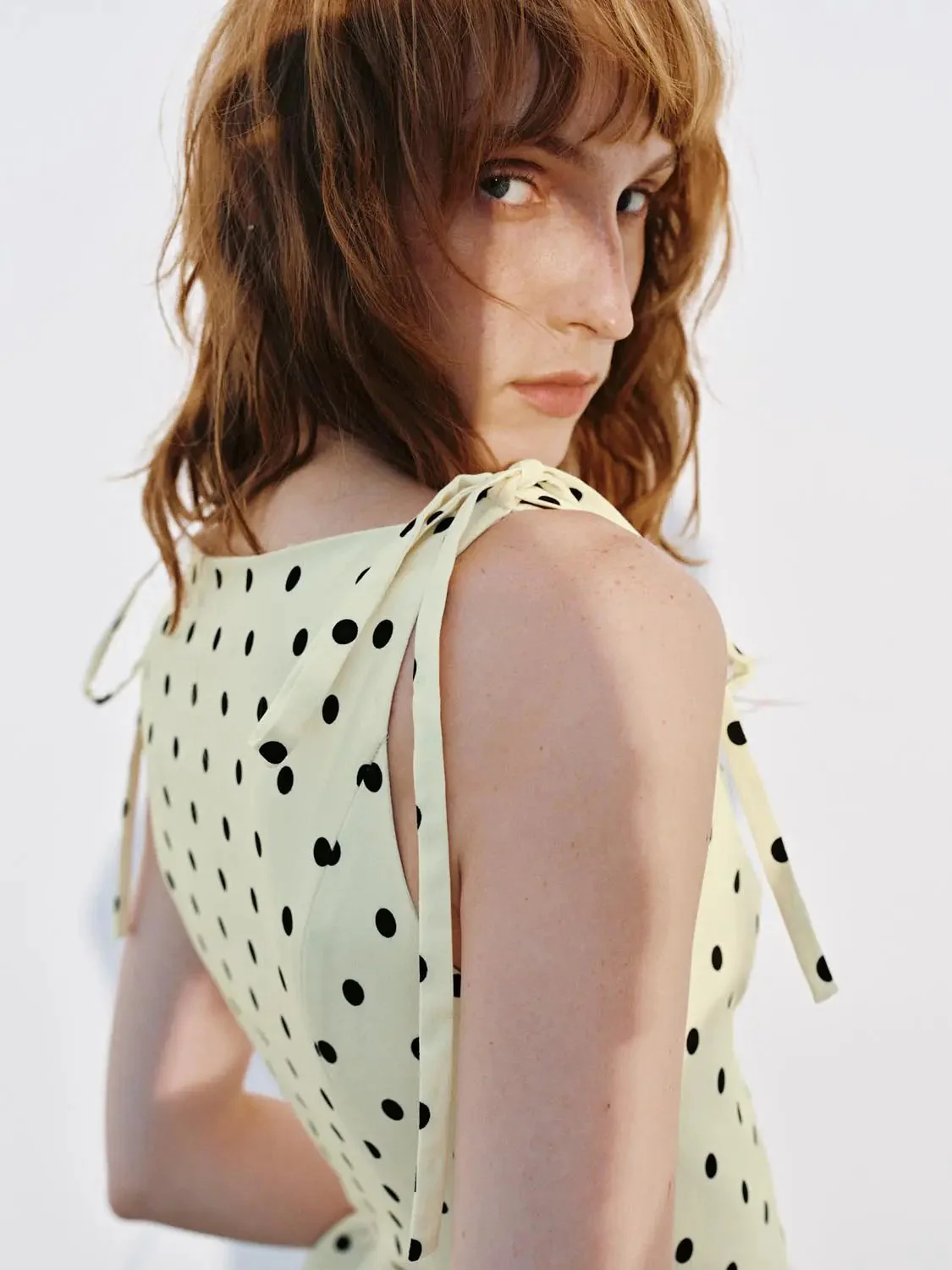 1275-polka-dotted-ruffle-trim-skinny-fit-sleeveless-shirts-3.webp Polka Dotted Ruffle Trim Skinny-Fit Sleeveless Shirts