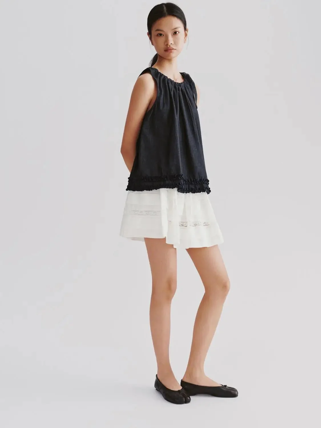 13649-lace-panel-white-tiered-a-line-mini-skirts-6.webp Lace Panel White Tiered A Line Mini Skirts
