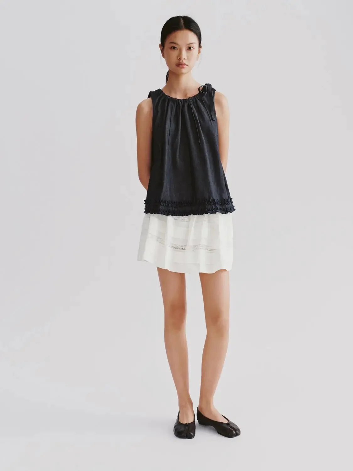 13649-lace-panel-white-tiered-a-line-mini-skirts-7.webp Lace Panel White Tiered A Line Mini Skirts