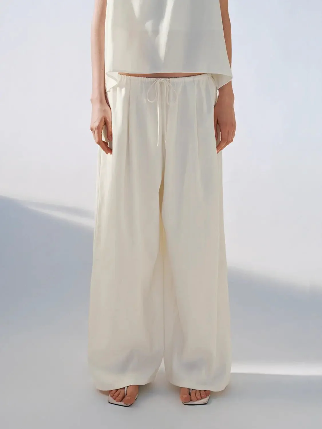 13707-lux-satin-wide-leg-drawstring-lounge-pants-1.webp Lux Satin Wide Leg Drawstring Lounge Pants