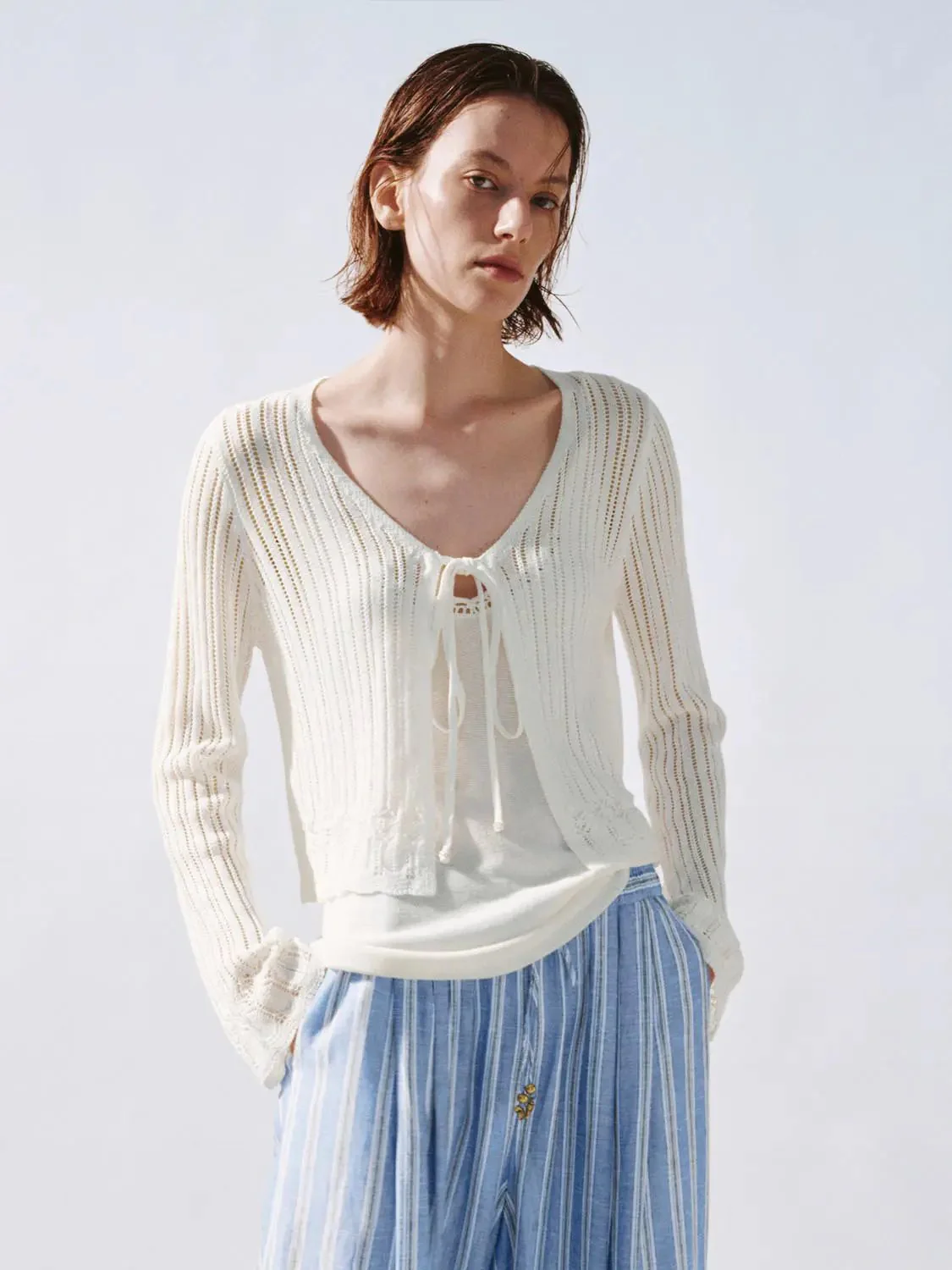 13854-premium-guipure-laced-tie-up-knitted-cardigans-1.webp Premium Guipure Laced Tie Up Knitted Cardigans