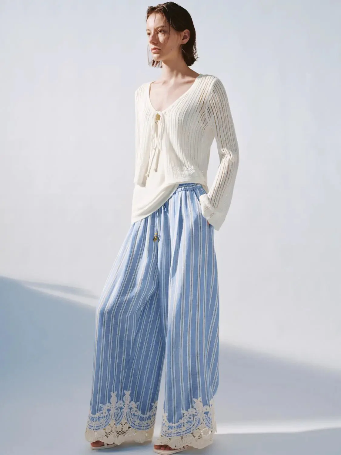 13854-premium-guipure-laced-tie-up-knitted-cardigans-4.webp Premium Guipure Laced Tie Up Knitted Cardigans