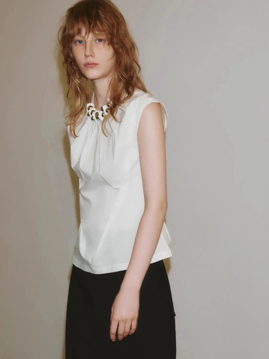 14516-metal-detail-sleeveless-pleated-overhead-shirts-2.webp Metal Detail Sleeveless Pleated Overhead Shirts