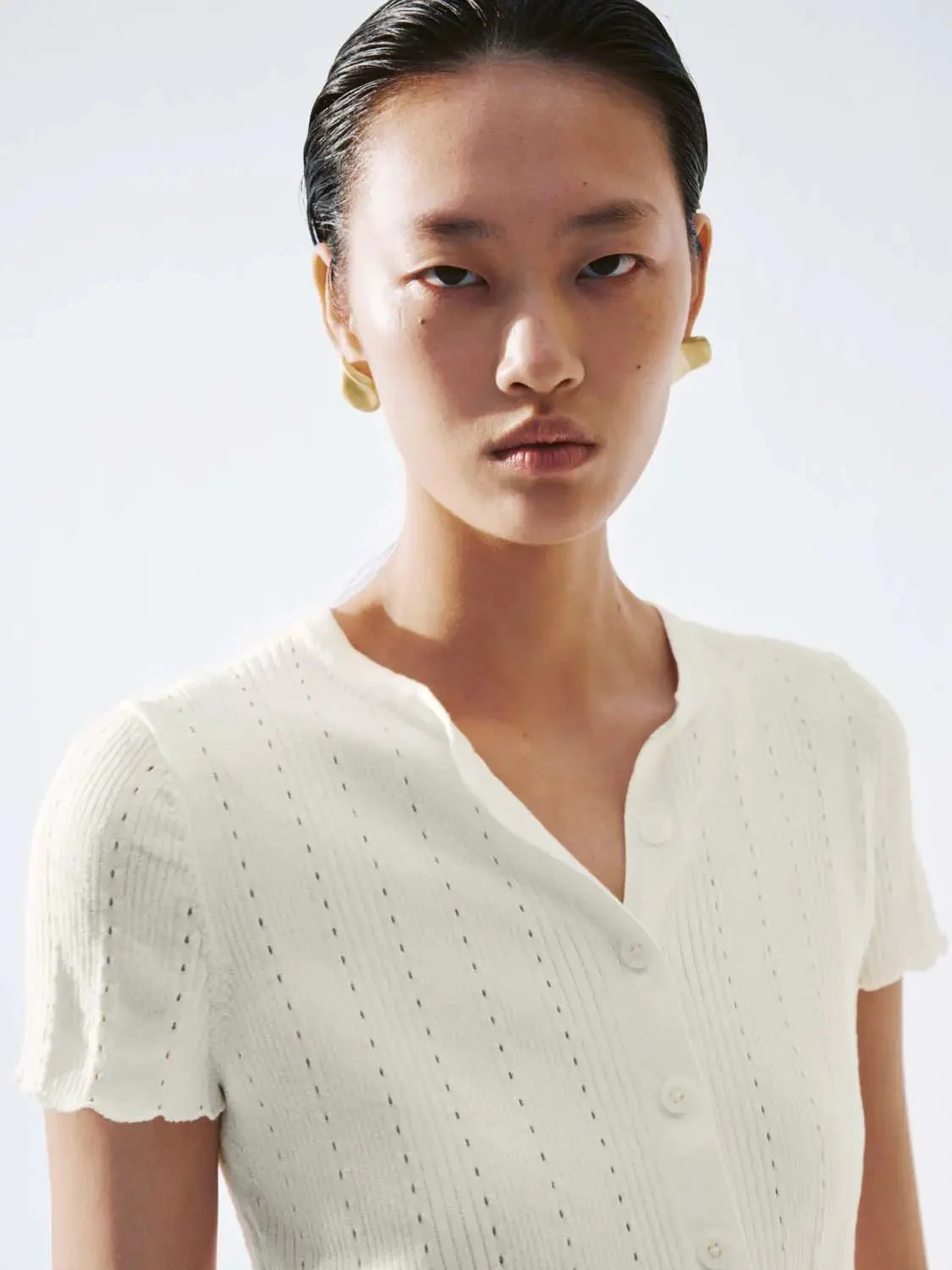 14750-short-sleeve-knitted-cardigans-11.webp Short Sleeve Knitted Cardigans