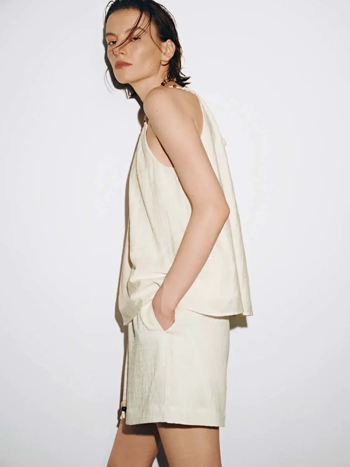 14811-sleeveless-ruched-overhead-shirts-2.webp Sleeveless Ruched Overhead Shirts