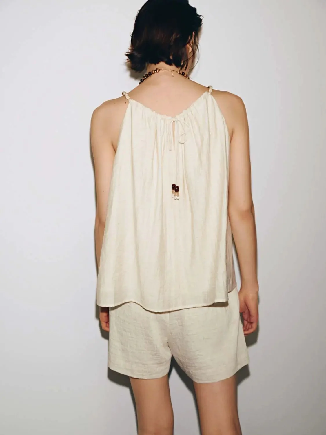 14811-sleeveless-ruched-overhead-shirts-3.webp Sleeveless Ruched Overhead Shirts