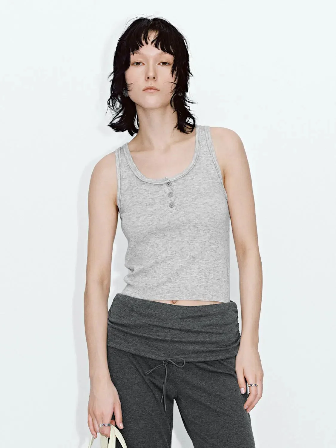 14833-henley-neck-sleeveless-knitted-t-shirts-1.webp Henley Neck Sleeveless Knitted T-Shirts
