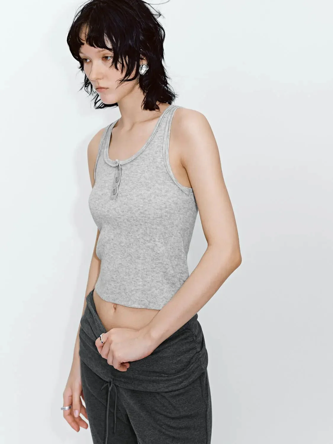14833-henley-neck-sleeveless-knitted-t-shirts-2.webp Henley Neck Sleeveless Knitted T-Shirts