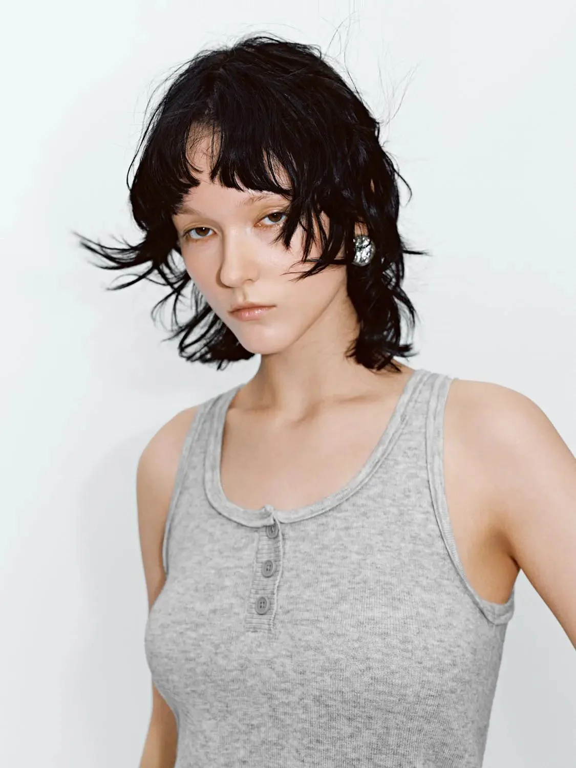 14833-henley-neck-sleeveless-knitted-t-shirts-3.webp Henley Neck Sleeveless Knitted T-Shirts