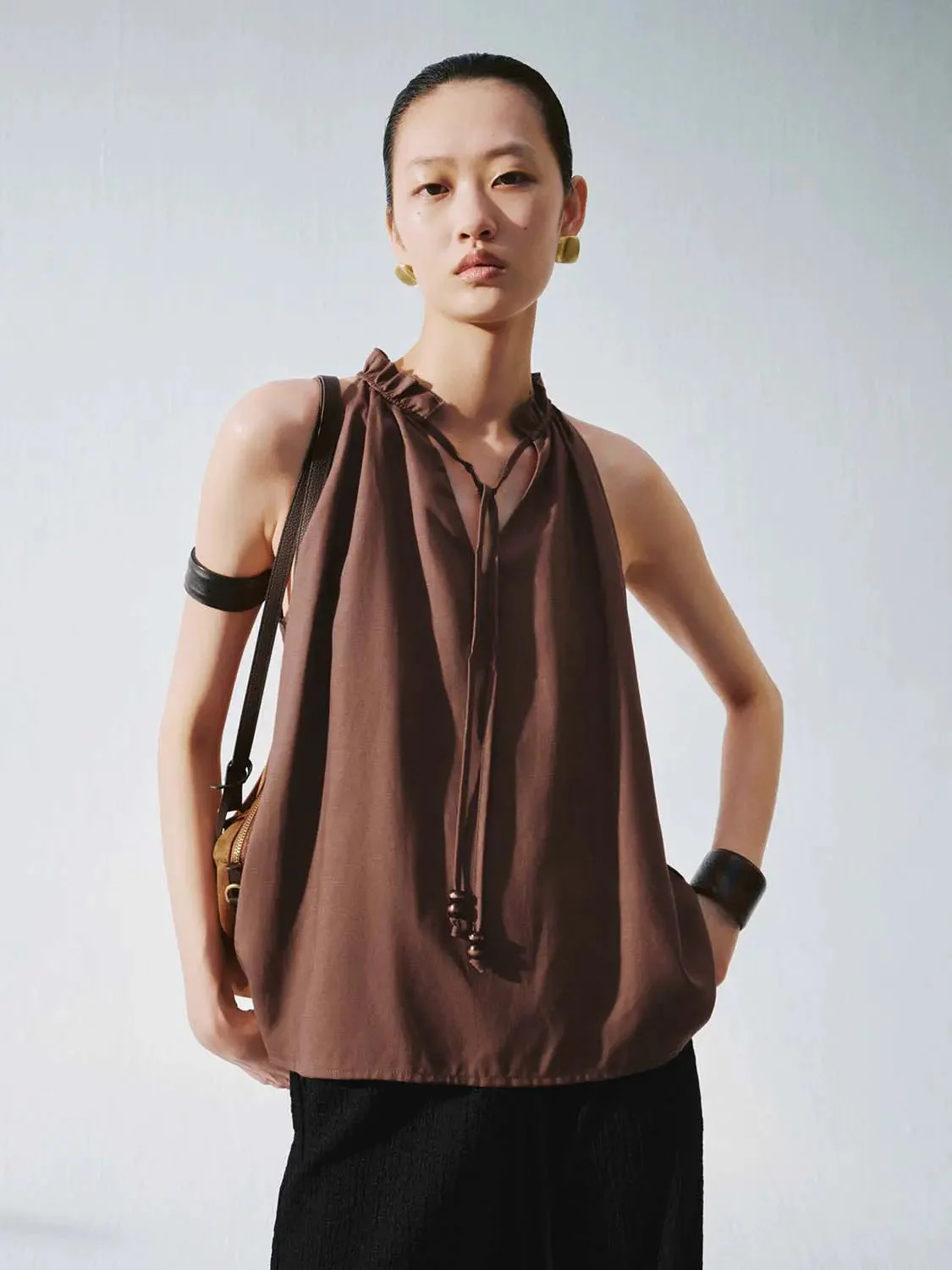 14858-frill-collar-tie-detail-sleeveless-overhead-shirts-1.webp Frill Collar Tie Detail Sleeveless Overhead Shirts