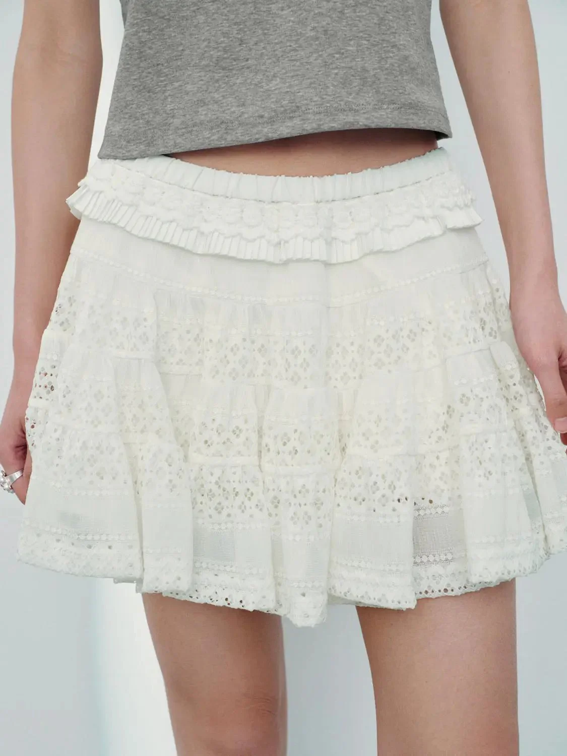 15216-guipure-lace-tiered-a-line-mini-skirts-5.webp Guipure Lace Tiered A-Line Mini Skirts