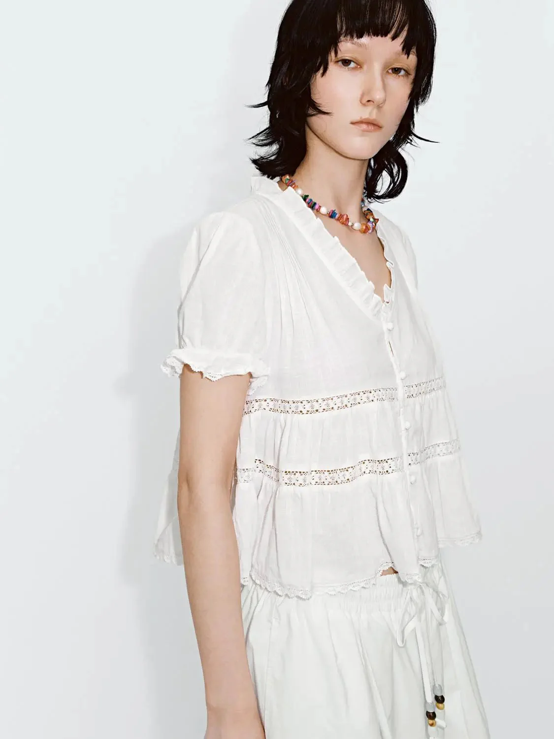 15221-ruffle-trim-lace-detail-v-neck-shirts-2.webp Ruffle Trim Lace Detail V-Neck Shirts