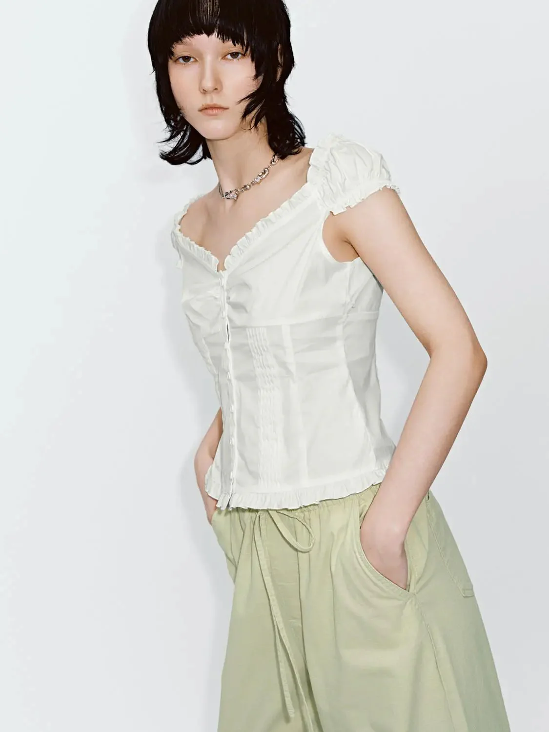 15356-v-neck-shirring-detail-ruffle-trim-short-sleeve-shirts-10.webp V-Neck Shirring Detail Ruffle Trim Short Sleeve Shirts