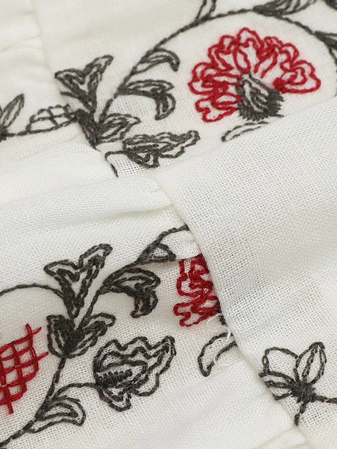 15470-floral-embroidered-pleated-a-line-mini-skirts-8.webp Floral Embroidered Pleated A-Line Mini Skirts