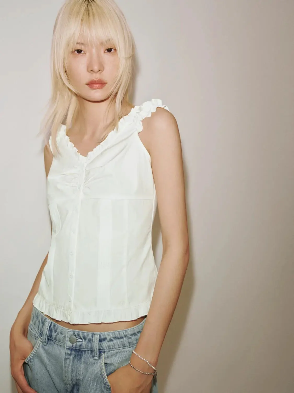 15623-capped-sleeve-ruffle-hem-v-neck-shirts-2.webp Capped Sleeve Ruffle Hem V-Neck Shirts