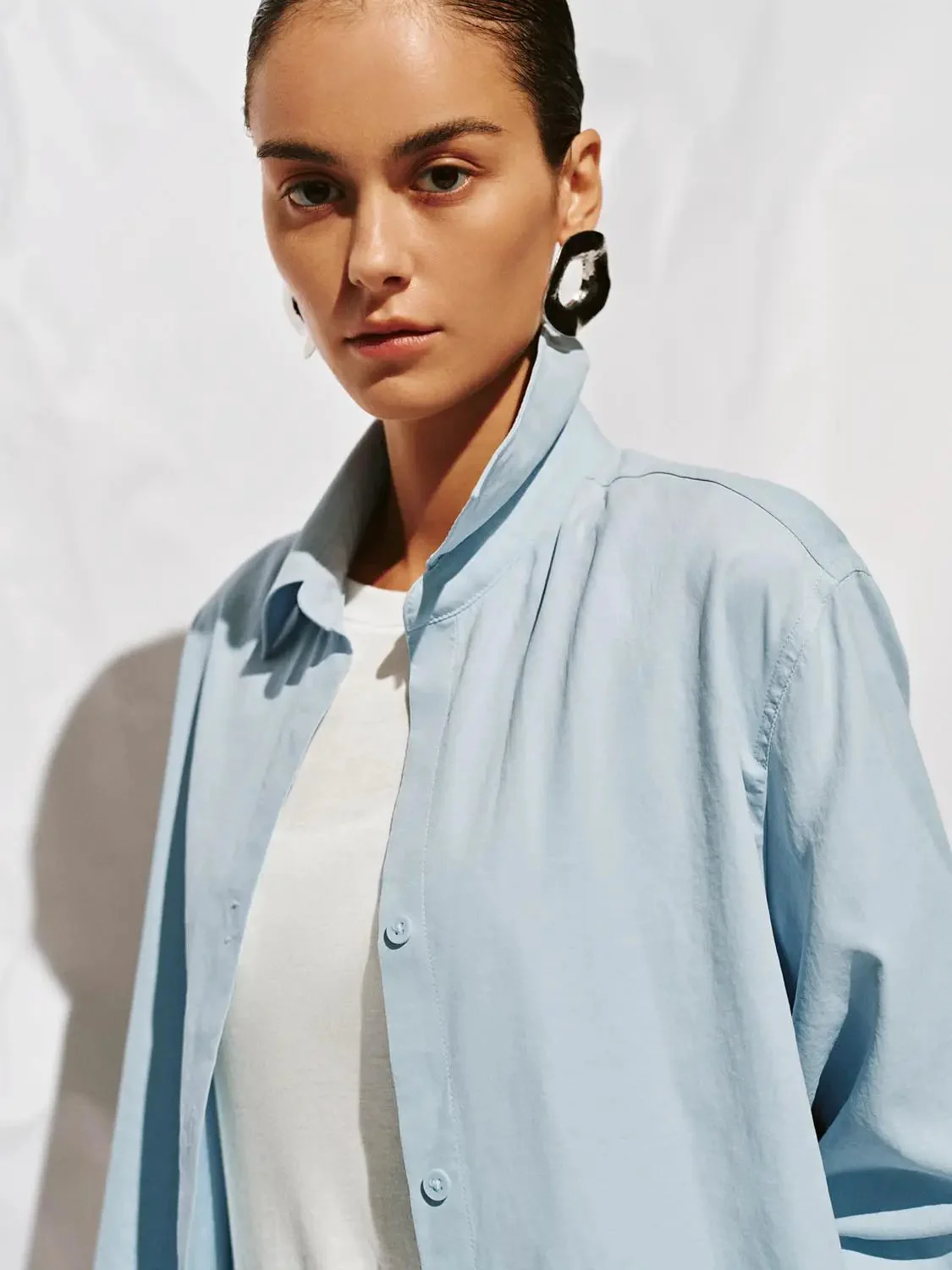 16183-crisp-white-button-up-minimalist-loose-fit-shirt-19.webp Crisp White Button Up Minimalist Loose Fit Shirt