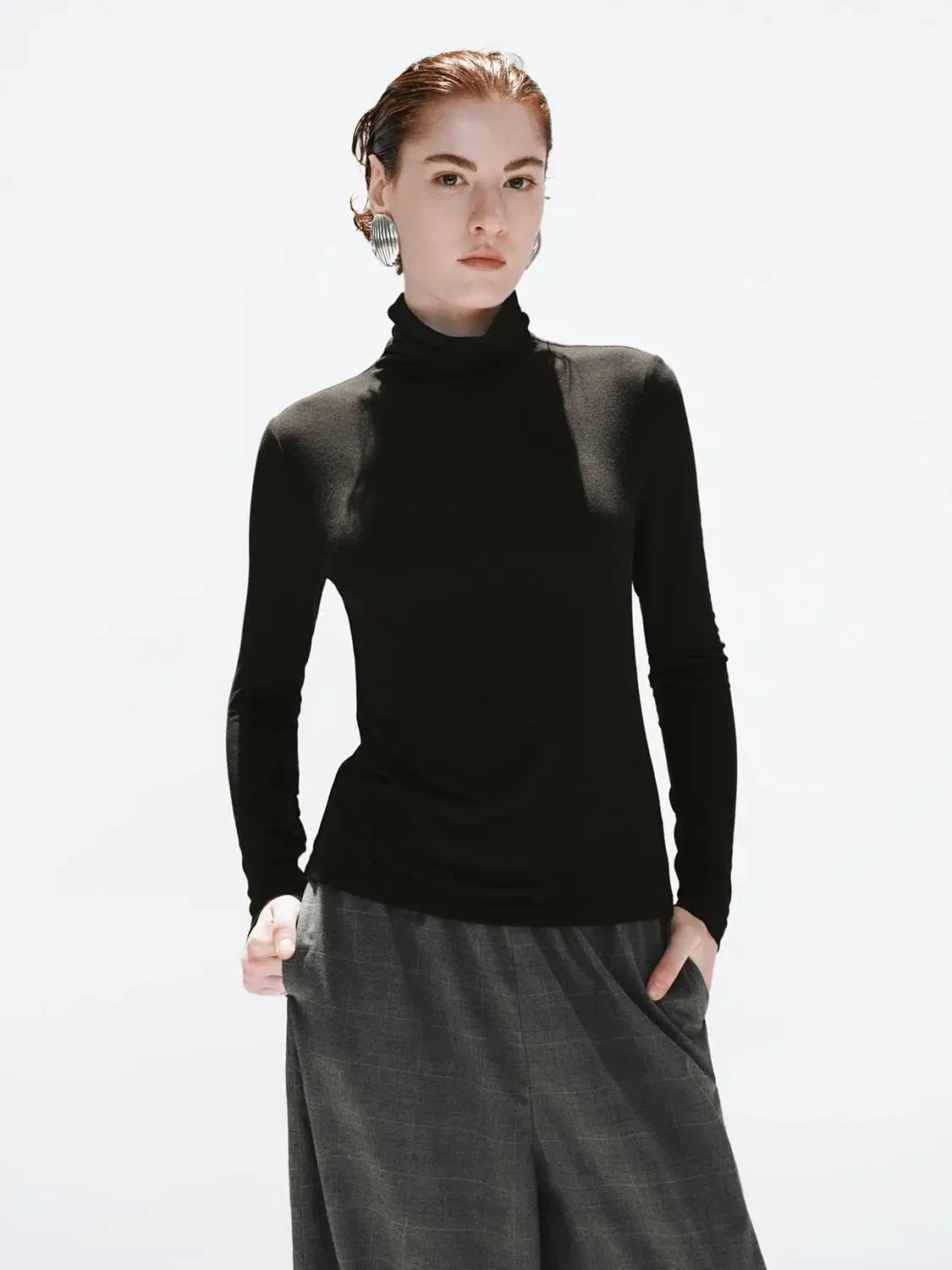 16221-minimalist-black-soft-knit-high-neck-long-sleeve-top-1.webp Minimalist Black Soft Knit High Neck Long Sleeve Top