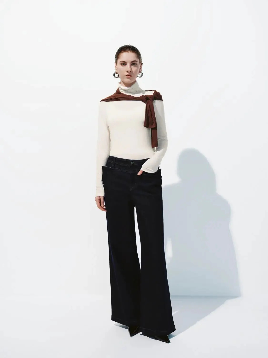 16221-minimalist-black-soft-knit-high-neck-long-sleeve-top-13.webp Minimalist Black Soft Knit High Neck Long Sleeve Top