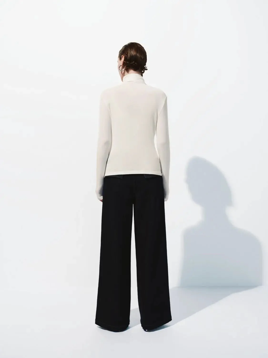 16221-minimalist-black-soft-knit-high-neck-long-sleeve-top-14.webp Minimalist Black Soft Knit High Neck Long Sleeve Top