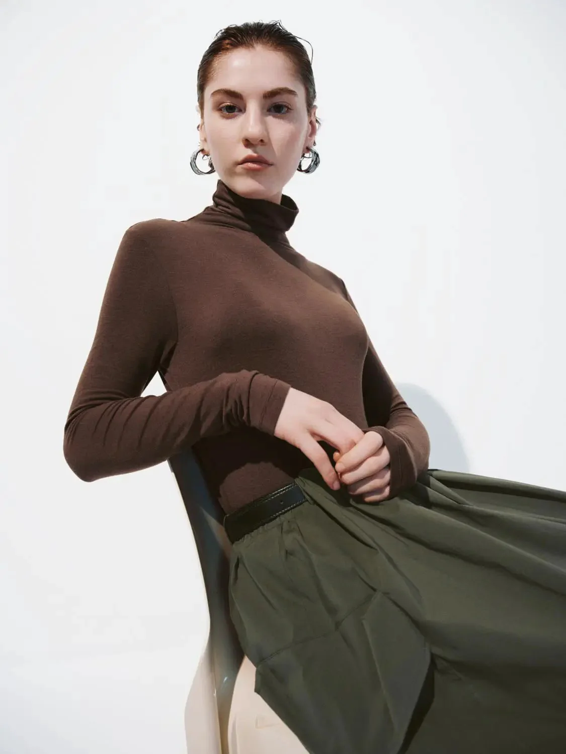 16221-minimalist-black-soft-knit-high-neck-long-sleeve-top-18.webp Minimalist Black Soft Knit High Neck Long Sleeve Top