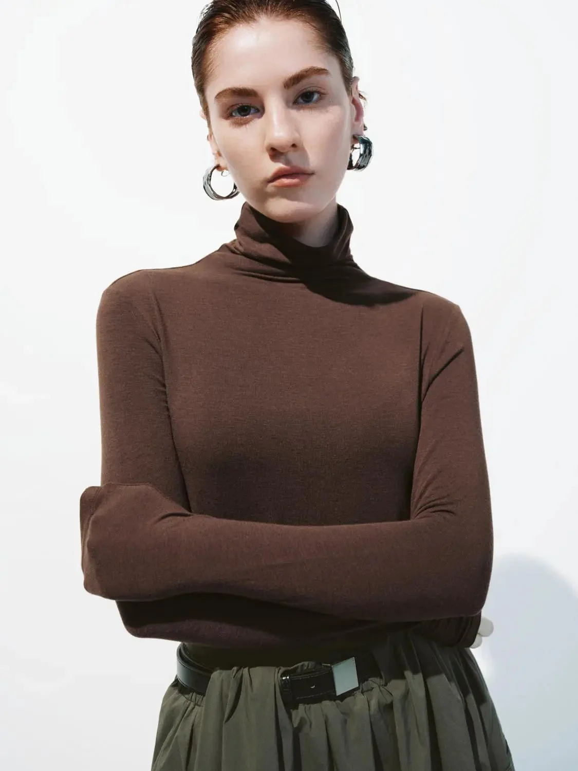 16221-minimalist-black-soft-knit-high-neck-long-sleeve-top-19.webp Minimalist Black Soft Knit High Neck Long Sleeve Top