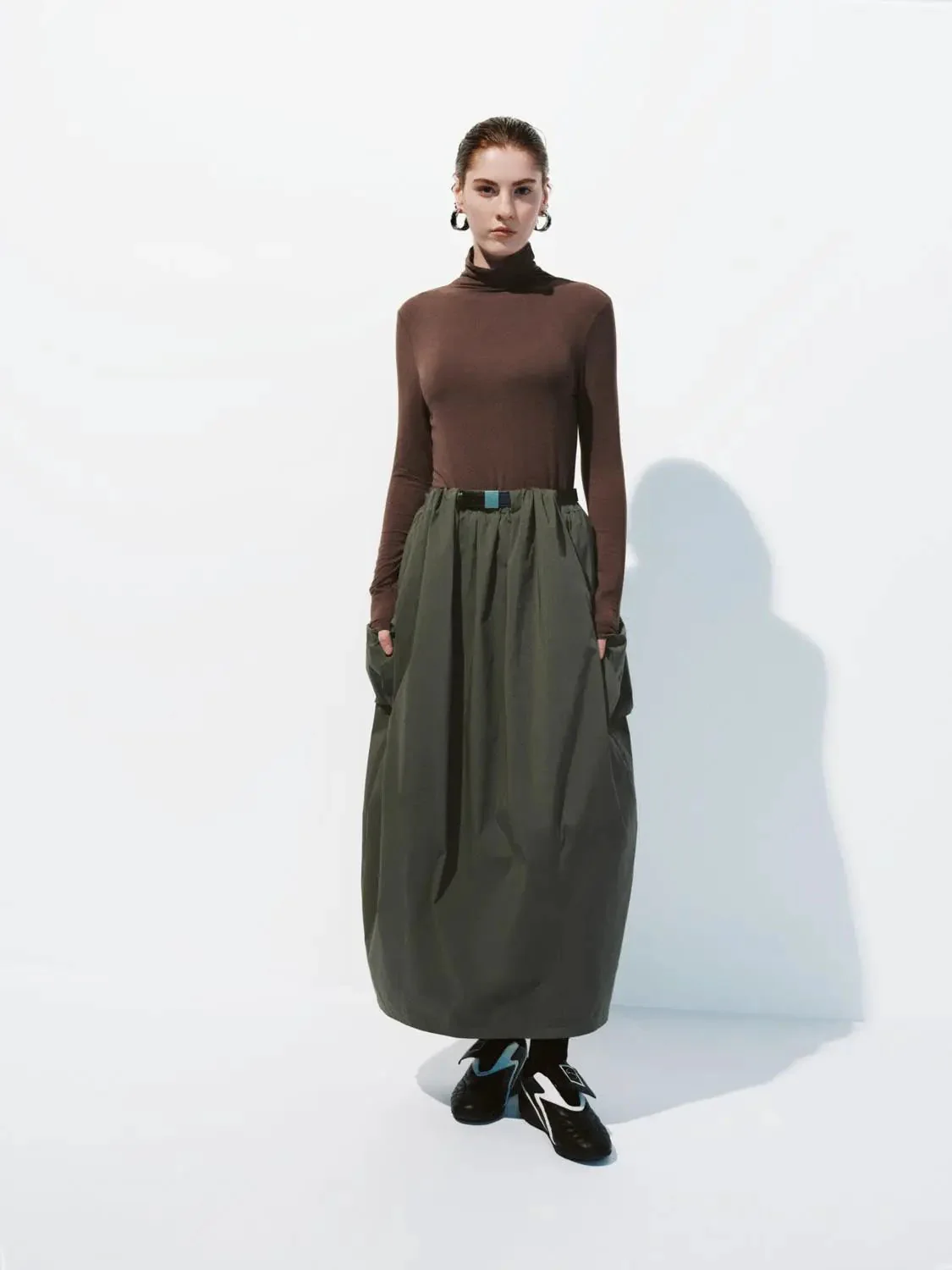 16221-minimalist-black-soft-knit-high-neck-long-sleeve-top-20.webp Minimalist Black Soft Knit High Neck Long Sleeve Top