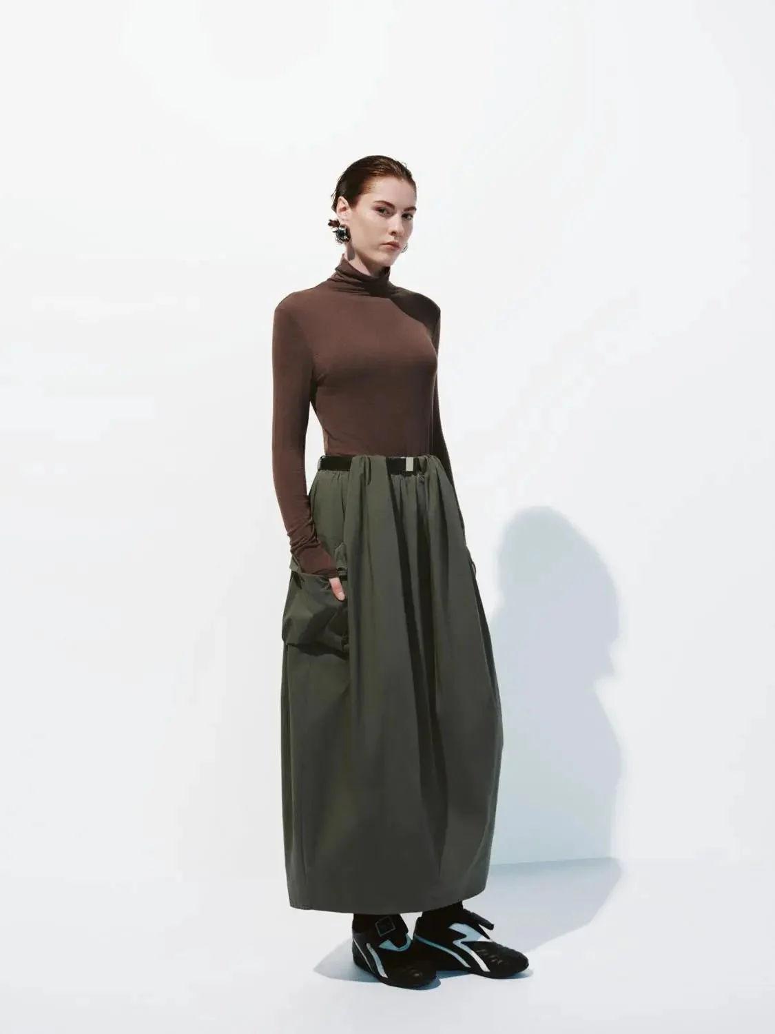16221-minimalist-black-soft-knit-high-neck-long-sleeve-top-21.webp Minimalist Black Soft Knit High Neck Long Sleeve Top