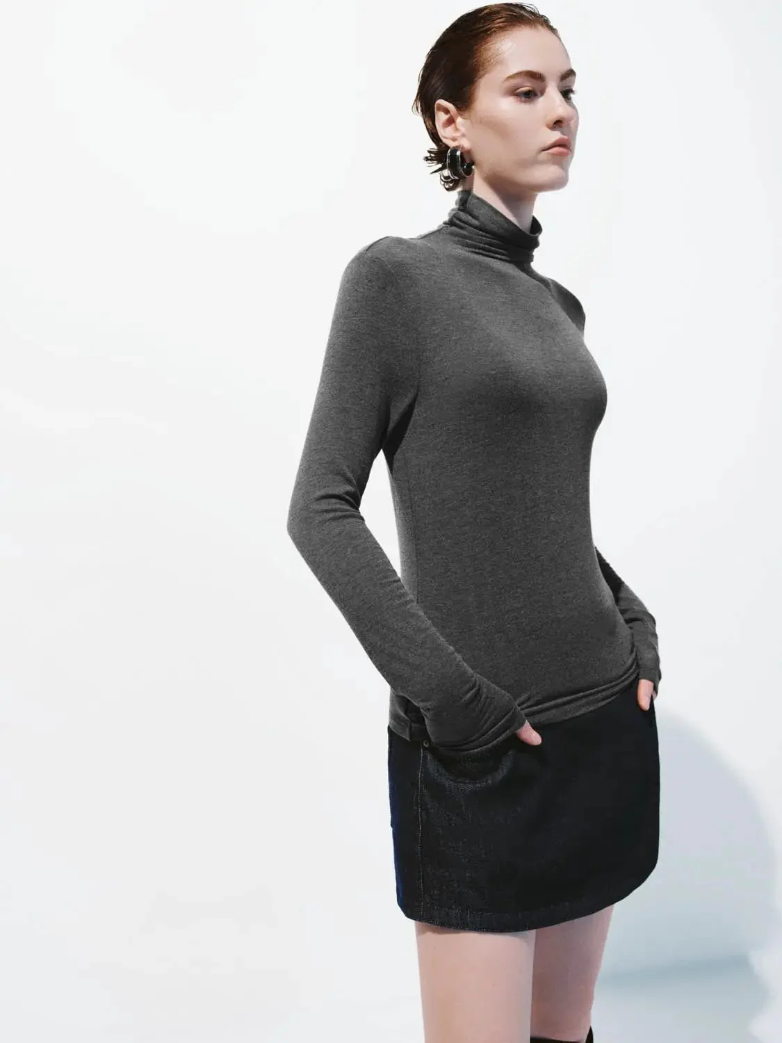 16221-minimalist-black-soft-knit-high-neck-long-sleeve-top-26.webp Minimalist Black Soft Knit High Neck Long Sleeve Top