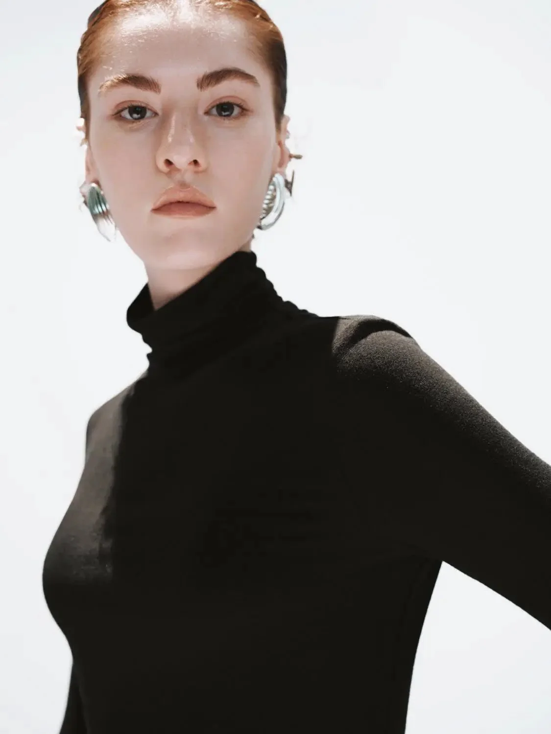 16221-minimalist-black-soft-knit-high-neck-long-sleeve-top-3.webp Minimalist Black Soft Knit High Neck Long Sleeve Top