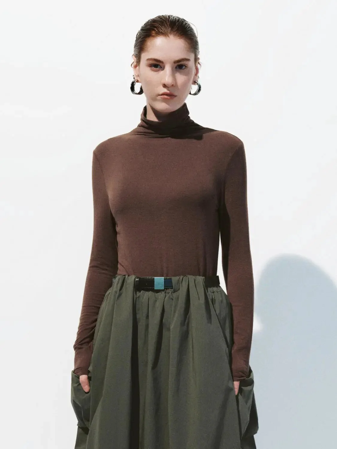 16221-minimalist-black-soft-knit-high-neck-long-sleeve-top-35.webp Minimalist Black Soft Knit High Neck Long Sleeve Top