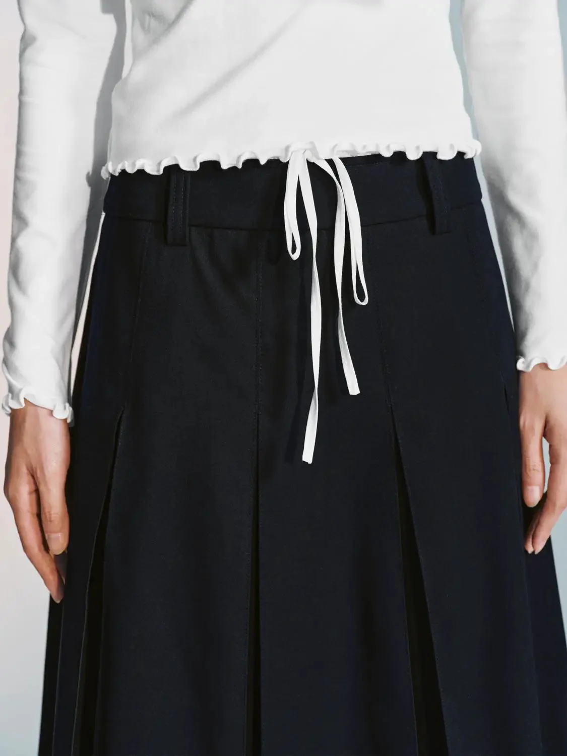 16783-contrast-trim-drawstring-pleated-a-line-mini-skirts-13.webp Contrast Trim Drawstring Pleated A-Line Mini Skirts
