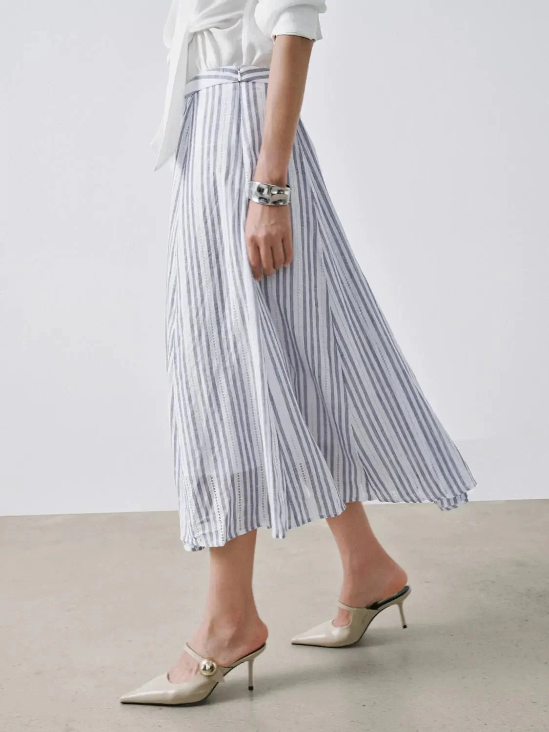 16808-linen-blend-contrast-striped-seamed-a-line-midi-skirts-3.webp Linen Blend Contrast Striped Seamed A-Line Midi Skirts