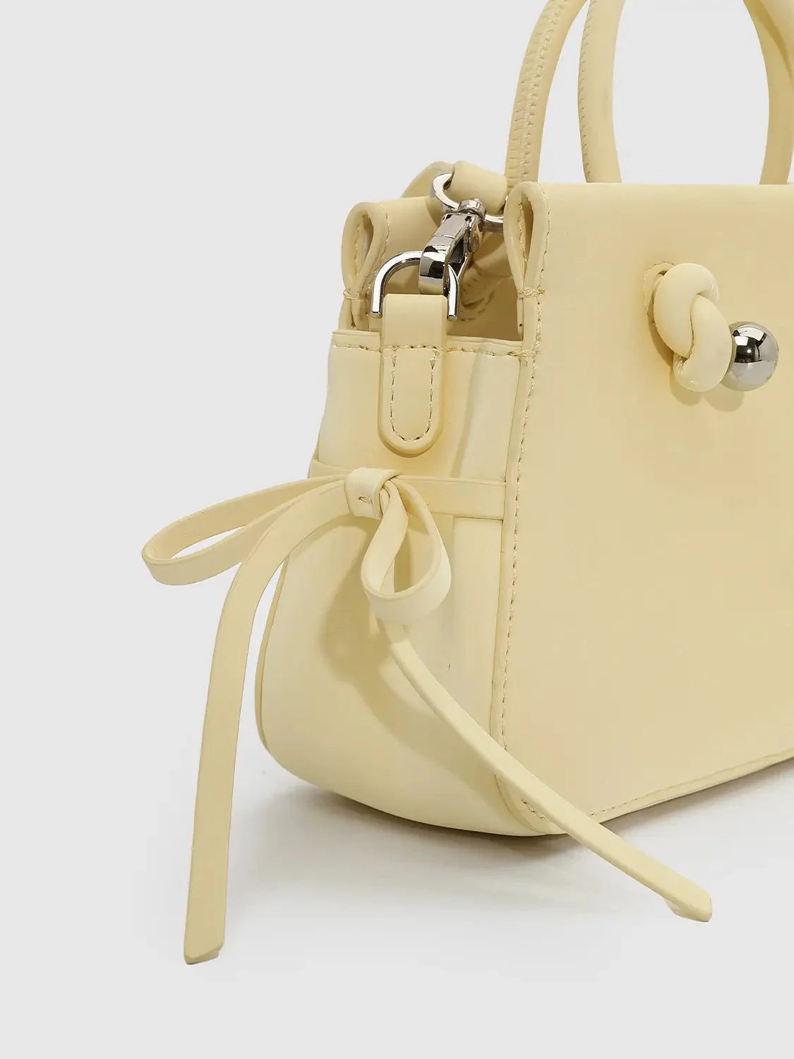 17181-faux-leather-bow-detail-handle-shoulder-bags-19.webp Faux Leather Bow Detail Handle Shoulder Bags