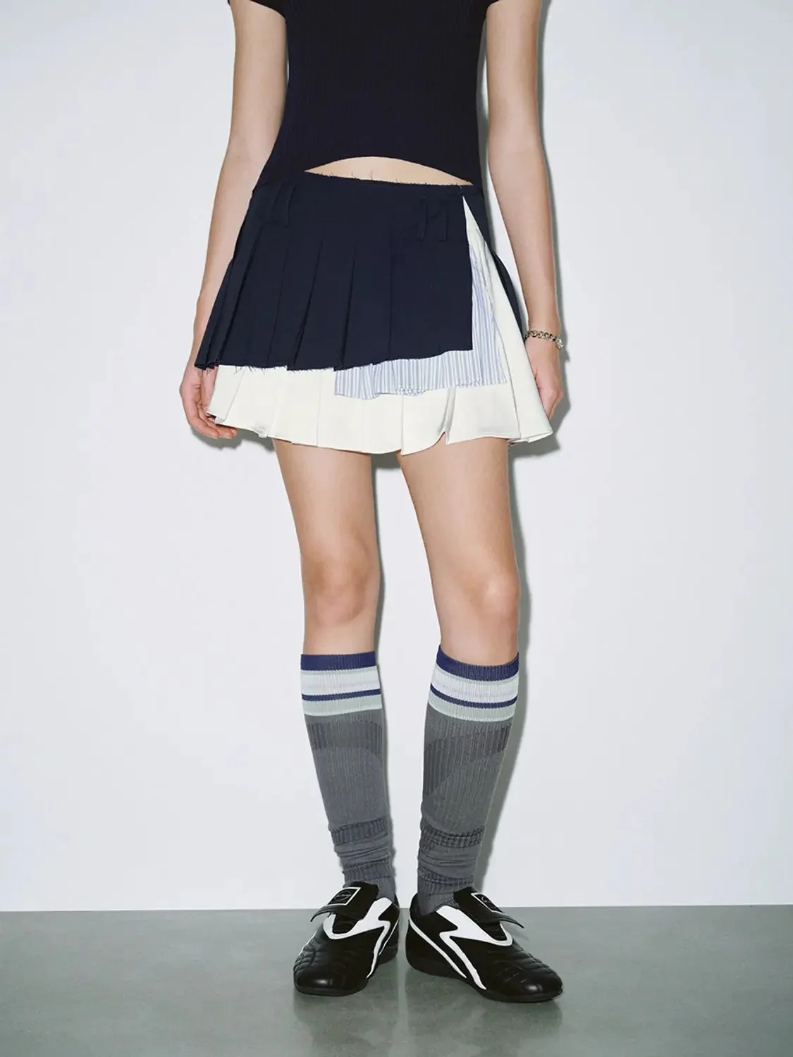1728-cotton-stripe-paneled-pleated-mini-skirt-1.webp Cotton Stripe Paneled Pleated Mini Skirt