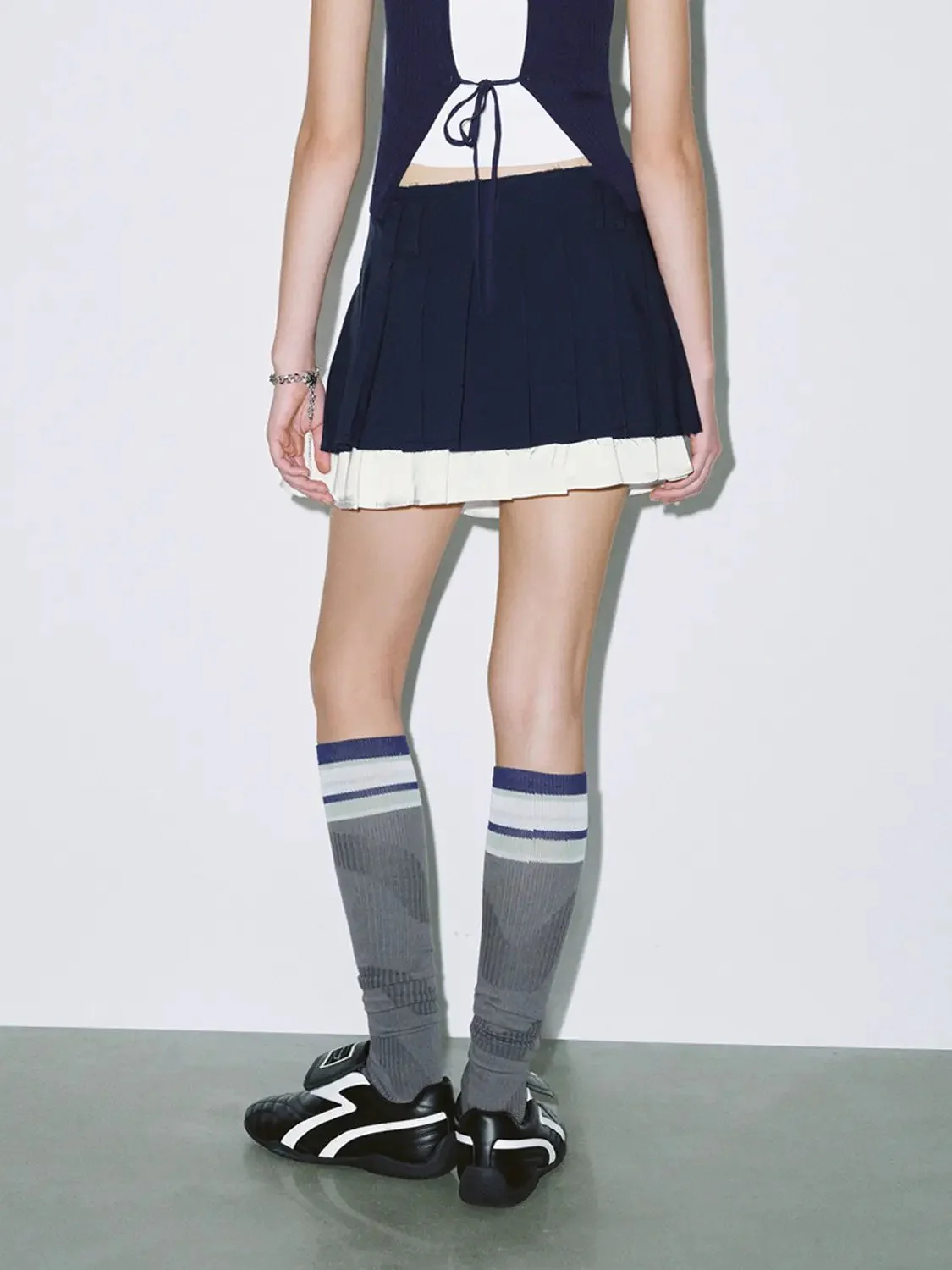 1728-cotton-stripe-paneled-pleated-mini-skirt-3.webp Cotton Stripe Paneled Pleated Mini Skirt