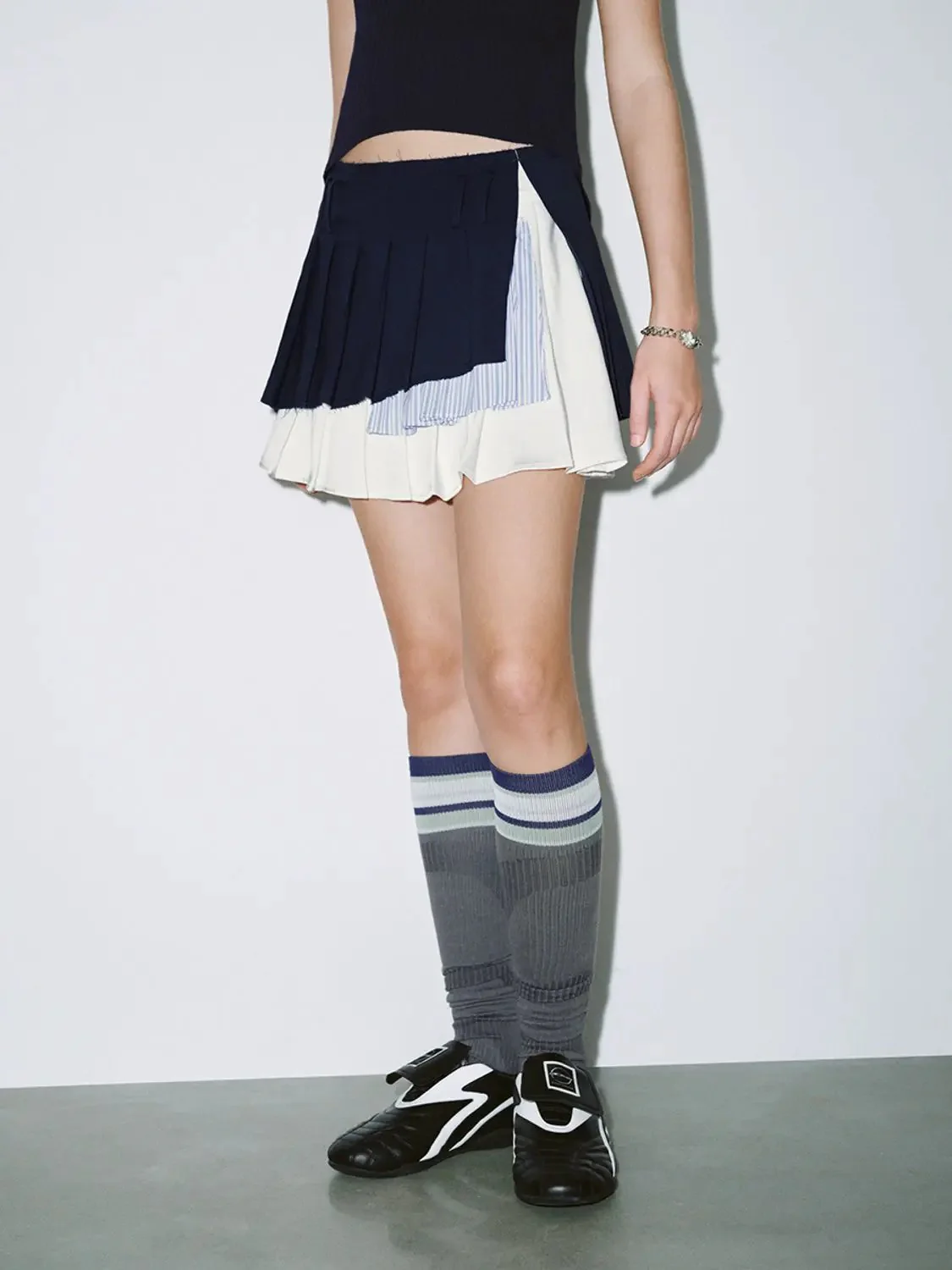 1728-cotton-stripe-paneled-pleated-mini-skirt-6.webp Cotton Stripe Paneled Pleated Mini Skirt