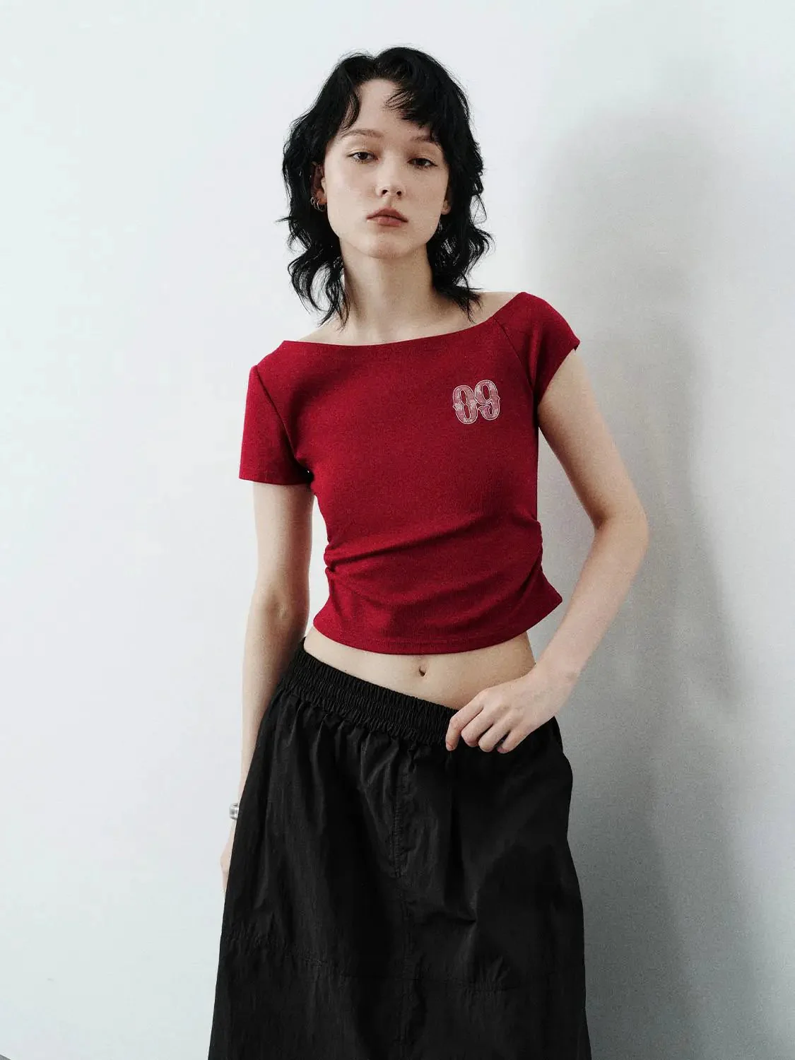 17974-cotton-sloped-shoulder-graphic-print-skinny-fit-t-shirts-9.webp Cotton Sloped Shoulder Graphic Print Skinny-Fit T-Shirts