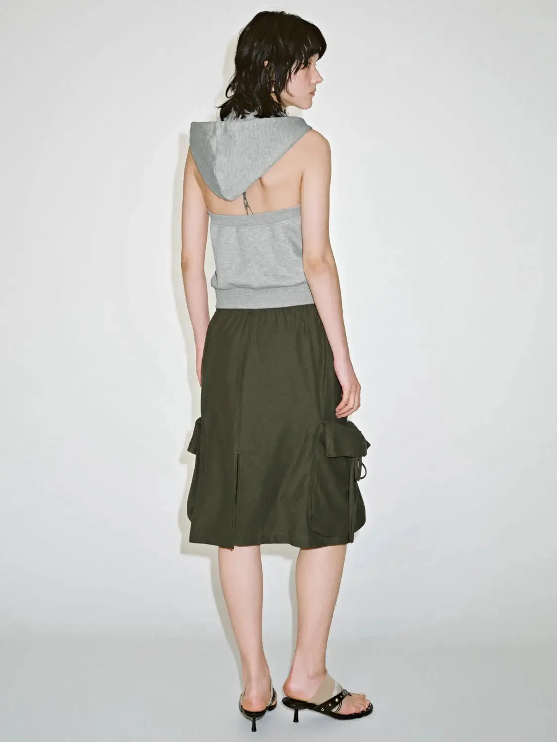 18535-olive-cotton-drawstring-cargo-flap-pockets-midi-skirts-4.webp Olive Cotton Drawstring Cargo Flap Pockets Midi Skirts