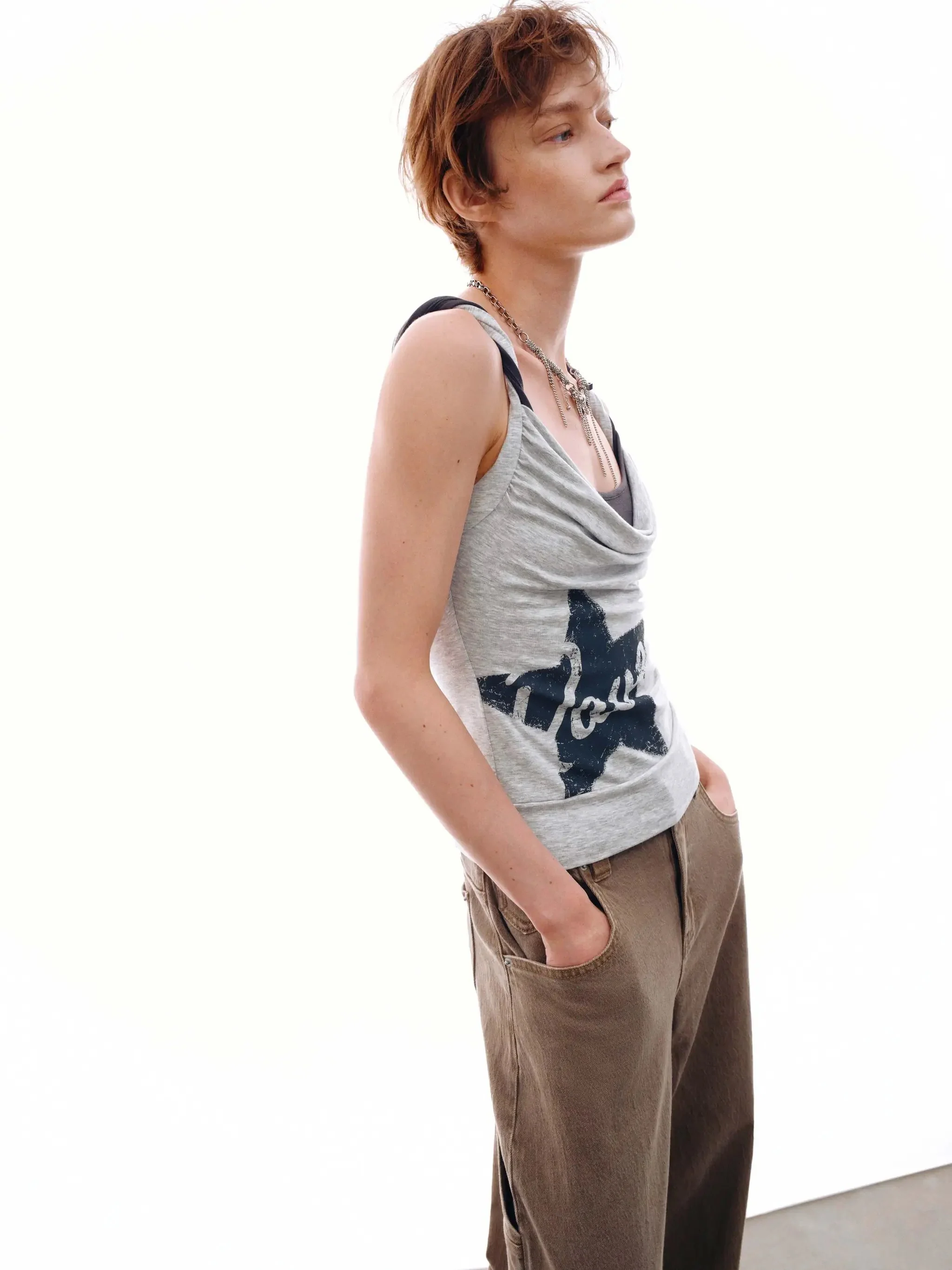 19095-viscose-blend-star-graphic-crisscross-strappy-tank-top-2.webp Viscose Blend Star Graphic Crisscross Strappy Tank Top